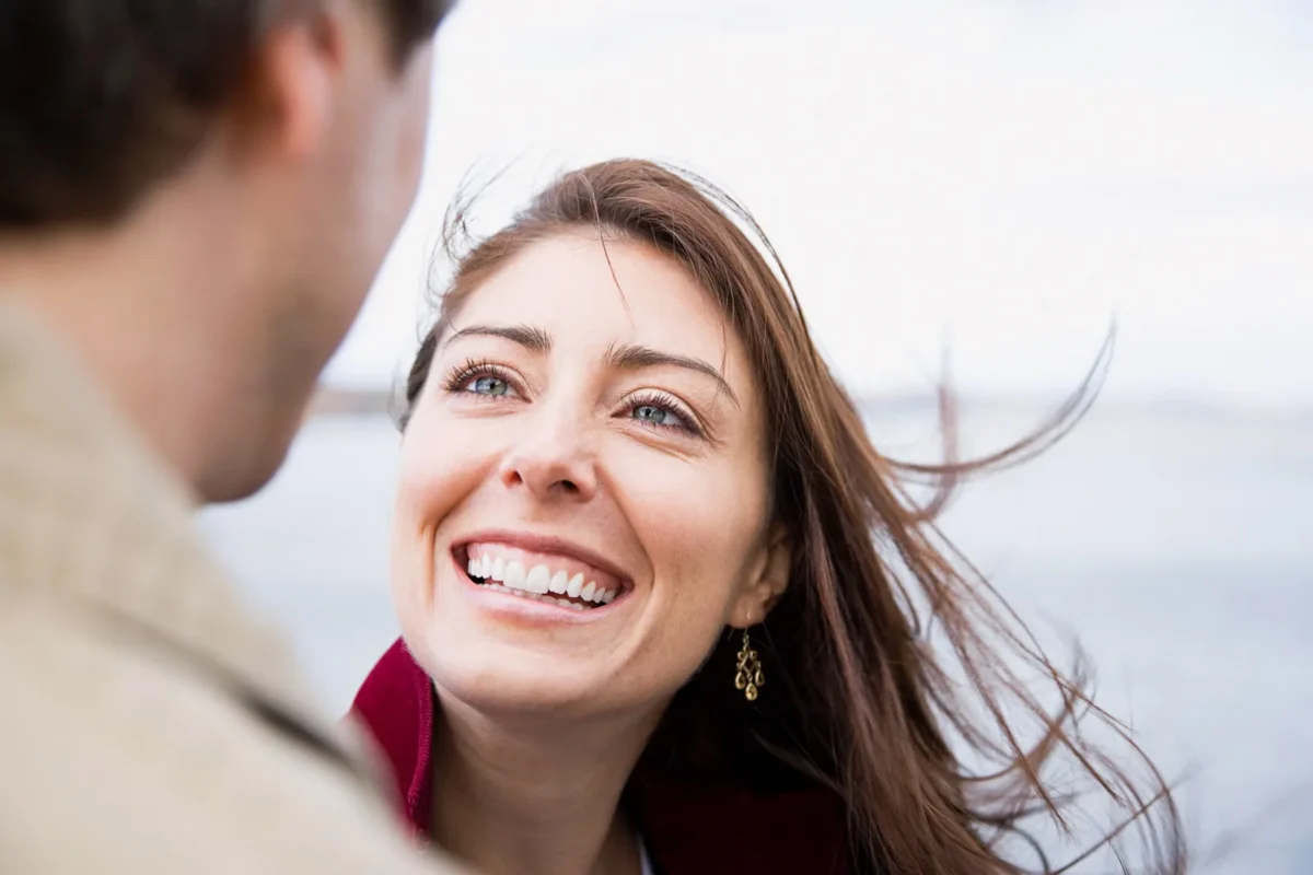 happy woman looking at man