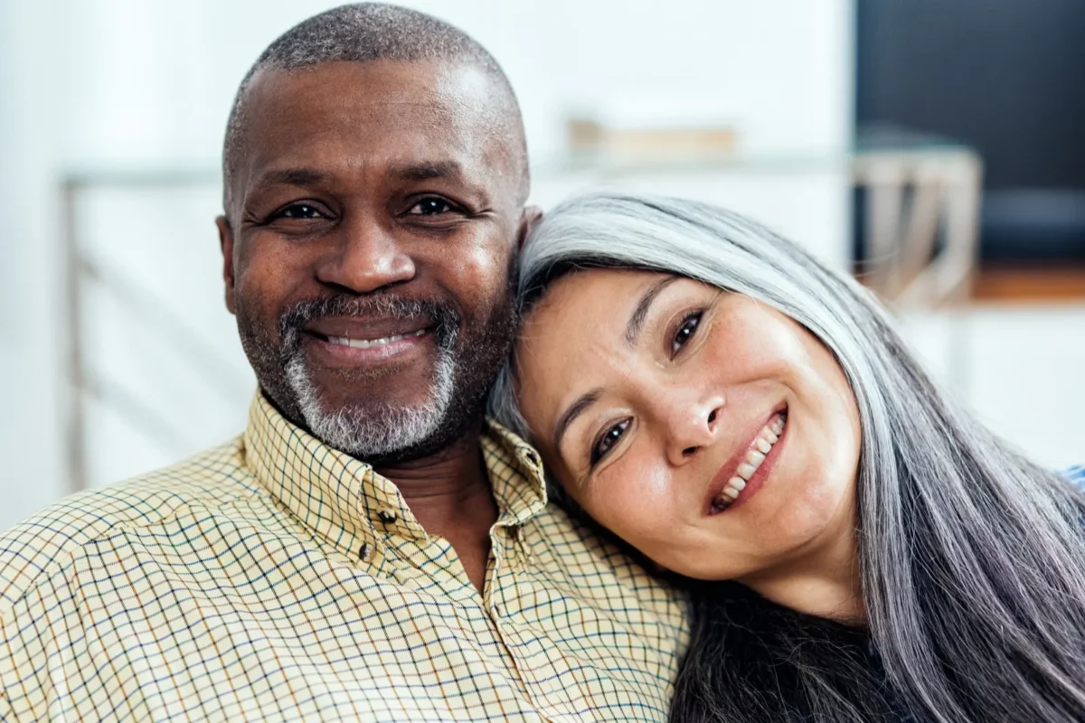 5 Things Men Want More Than Sex happy couple woman with head on his shoulder
