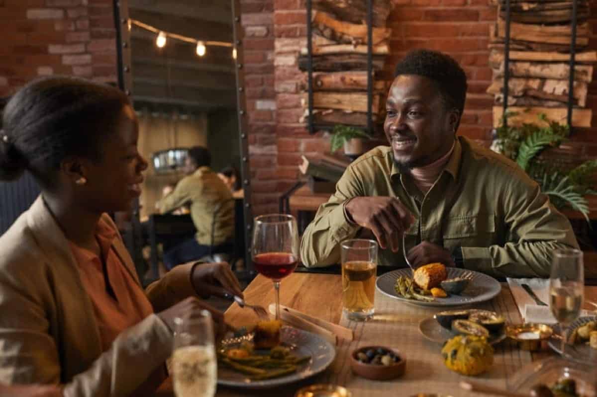 couple having romantic dinner at restaurant