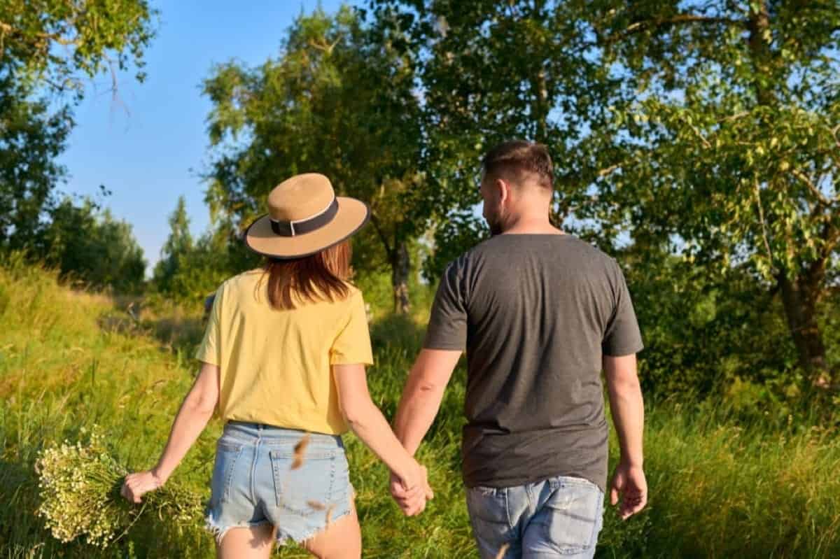 couple on nature walk for her birthday