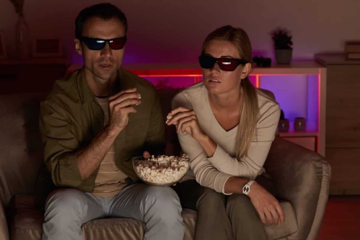 Couple watching 3D movie together