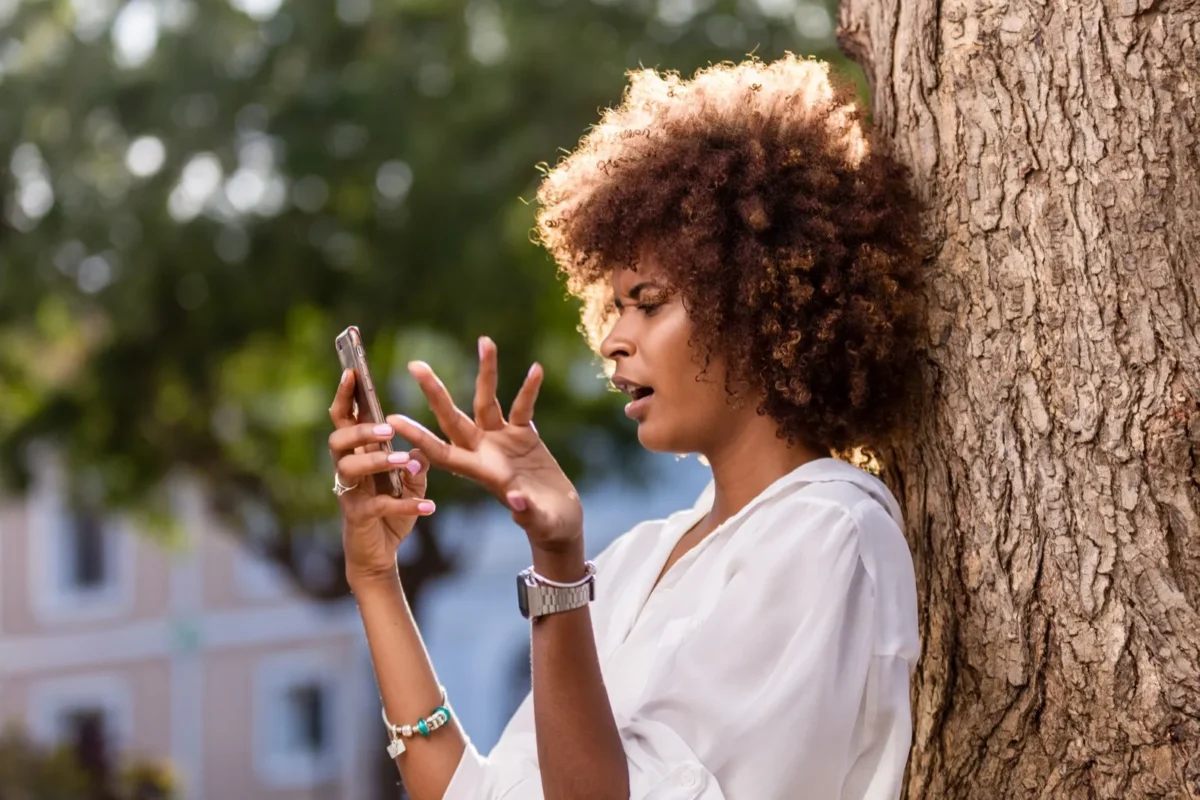 woman confused and texting