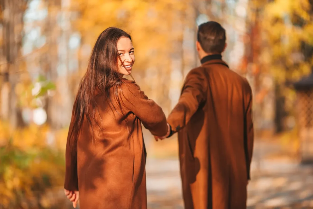 happy woman on autumn walk