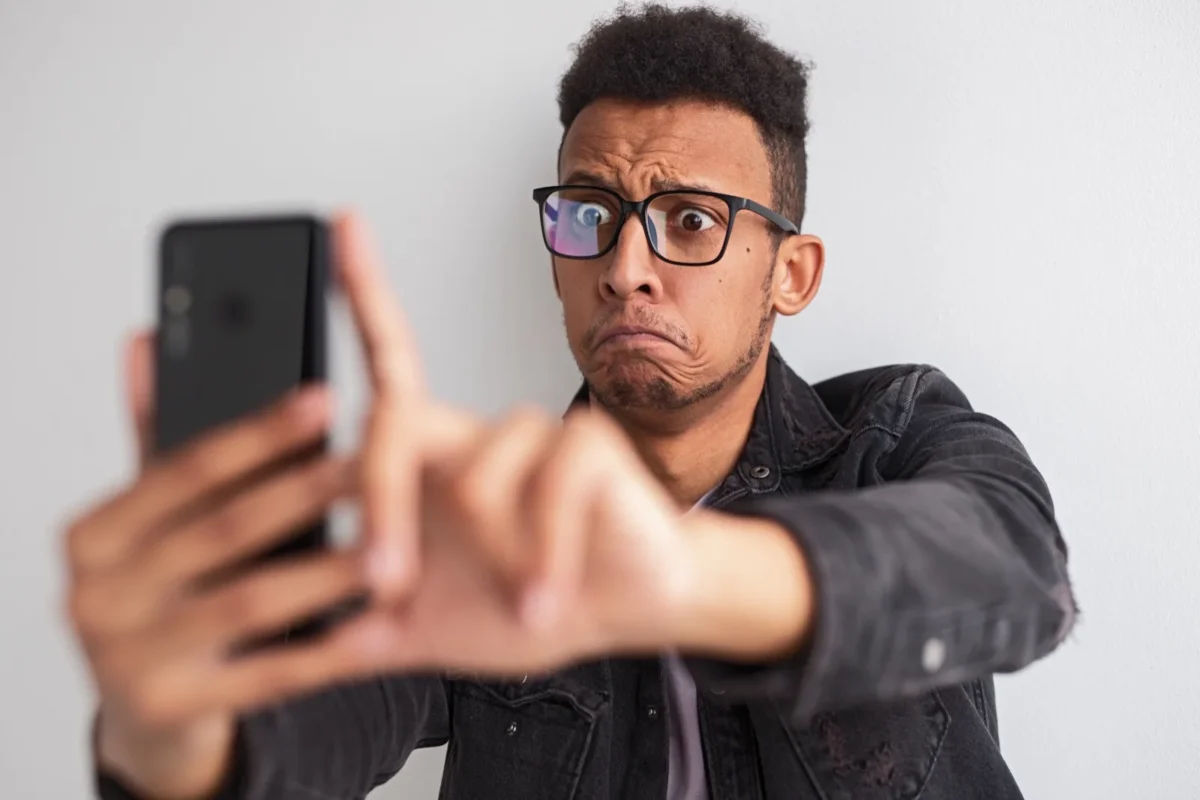confused man with phone