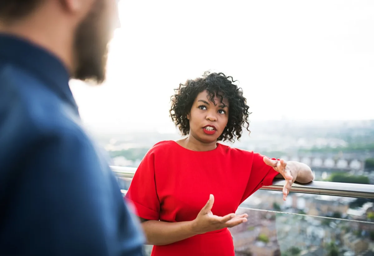 assertive woman communicating with man