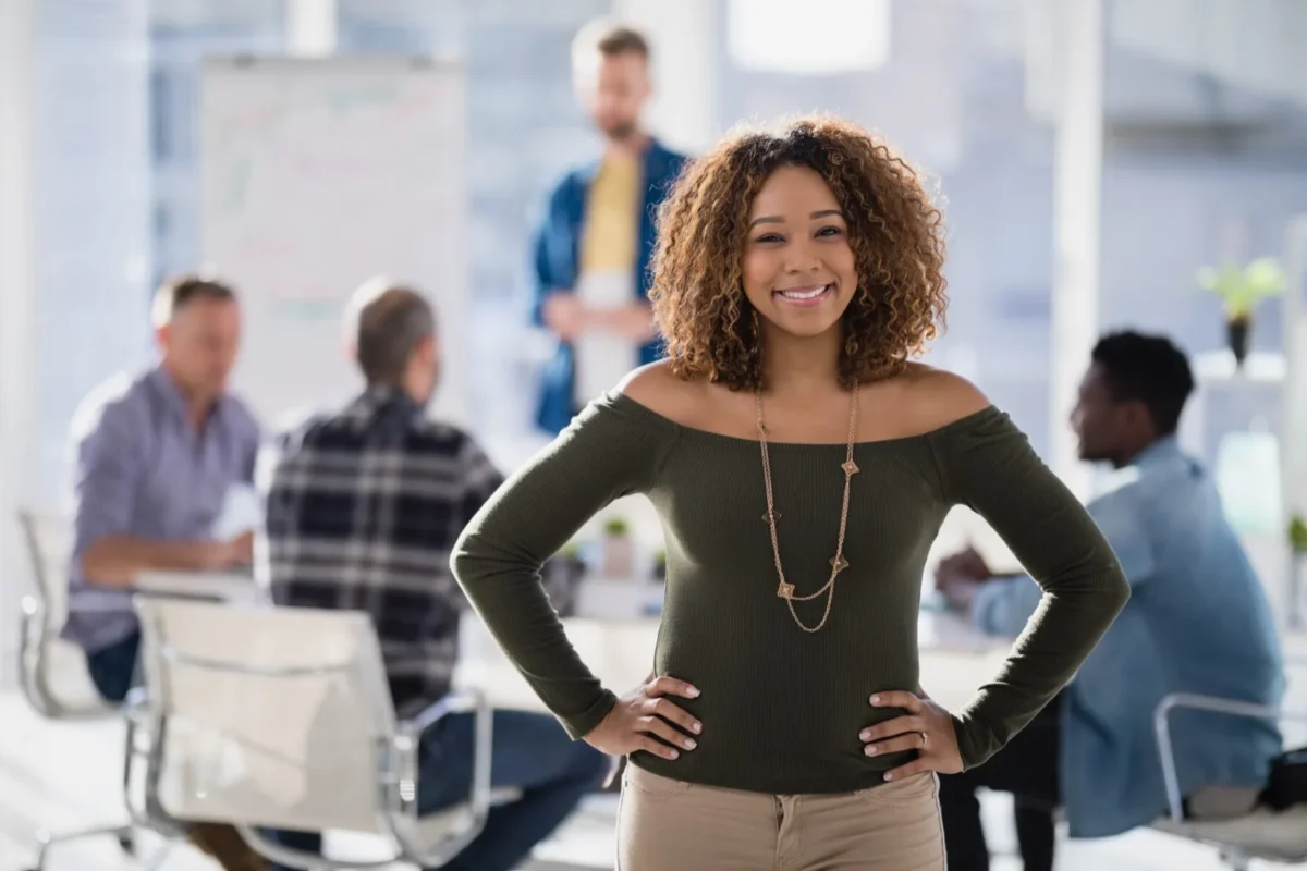 attractive and confident woman with hands on hips