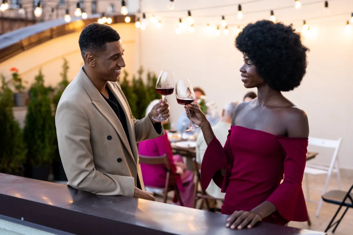 couple cheers on a date