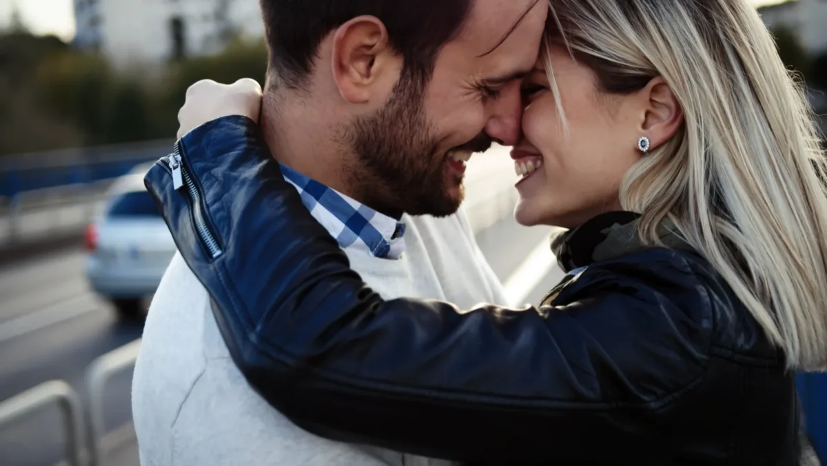 Attract The One happy couple kissing