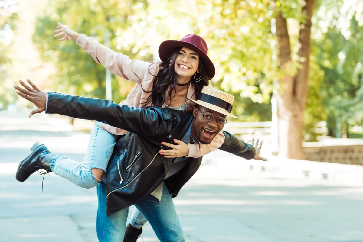 5 Things You Need To Do NOW To Be Happily In Love (Whether You're Single or Coupled Up) happy couple goofing off