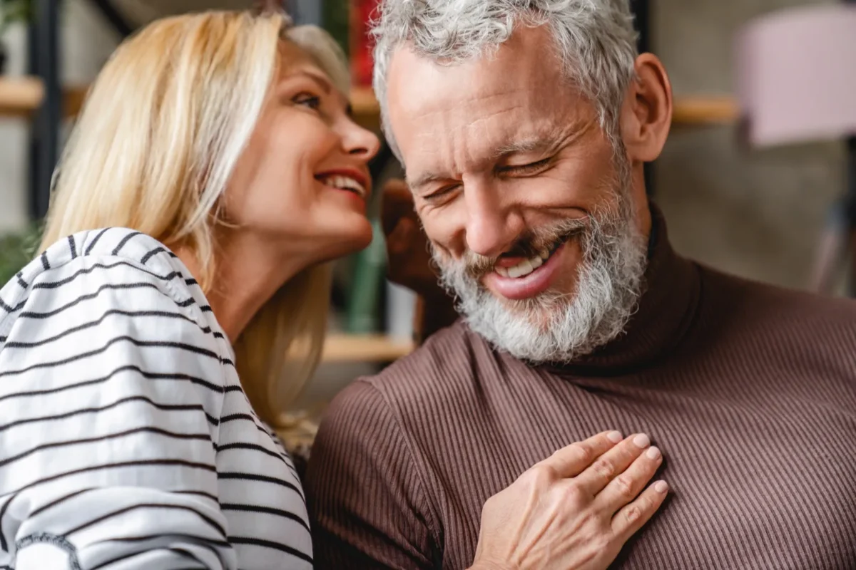man listening to woman