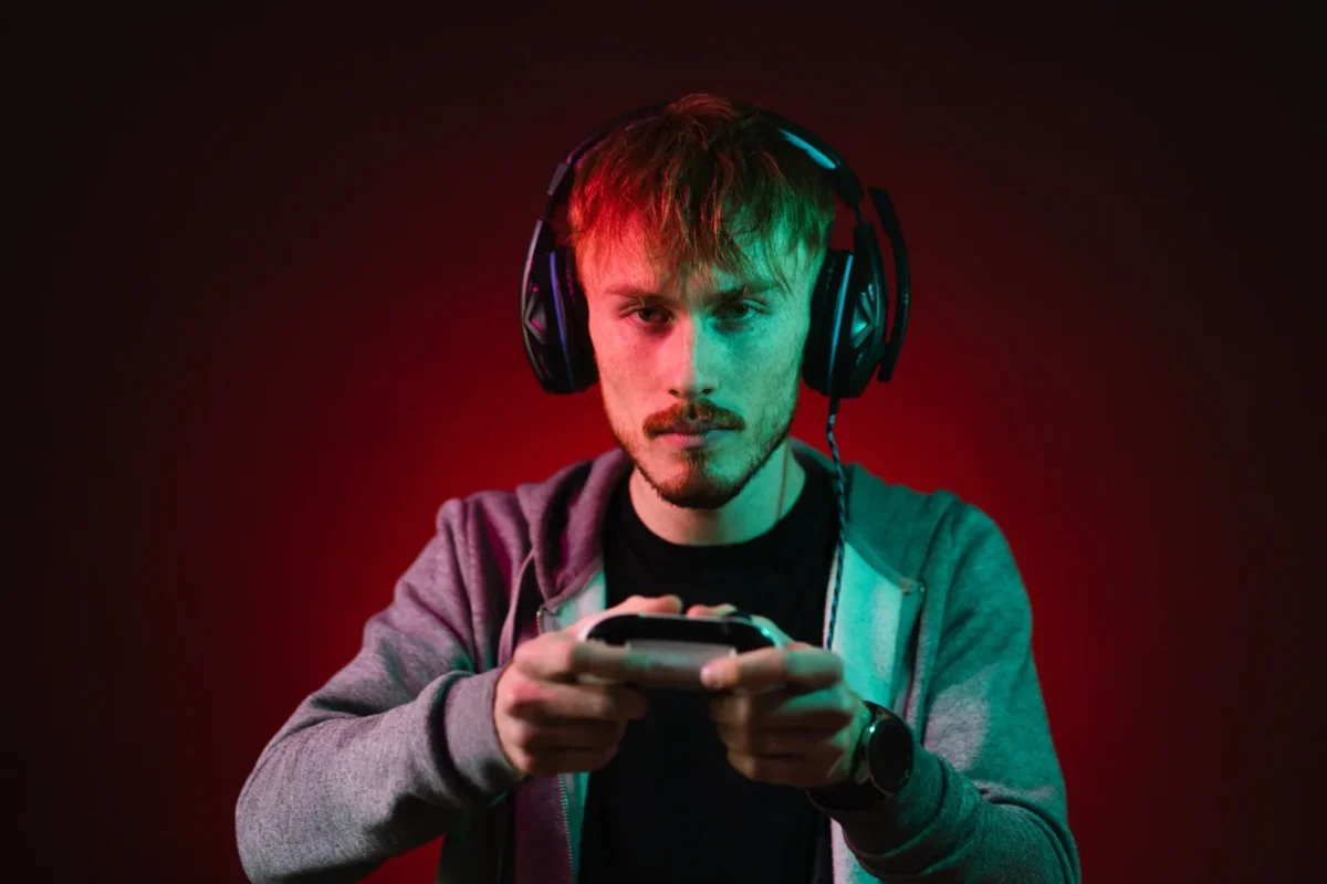 man holding video game controller
