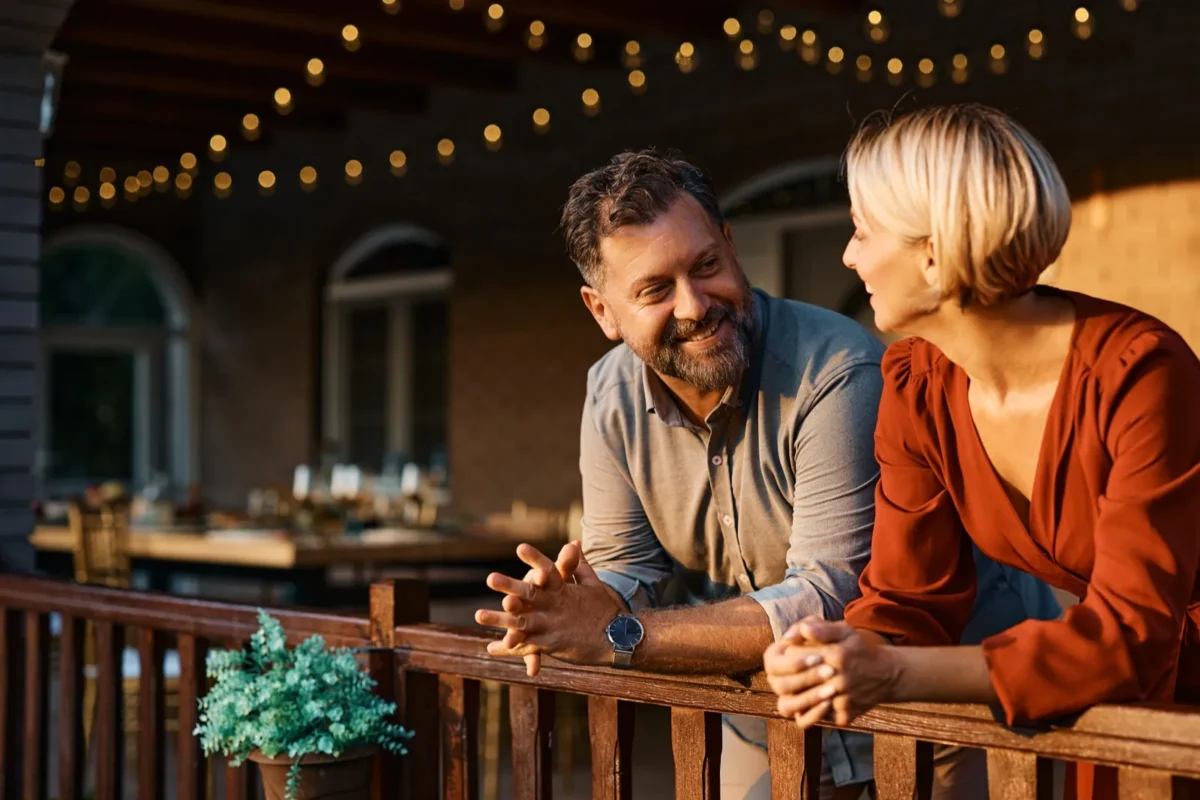 13 Crucial Ways To Show Your Husband You Appreciate Him couple talking on terrace