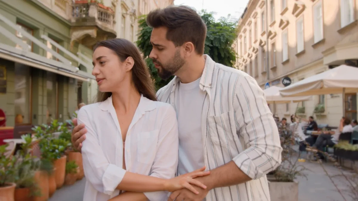 woman avoiding a man's touch