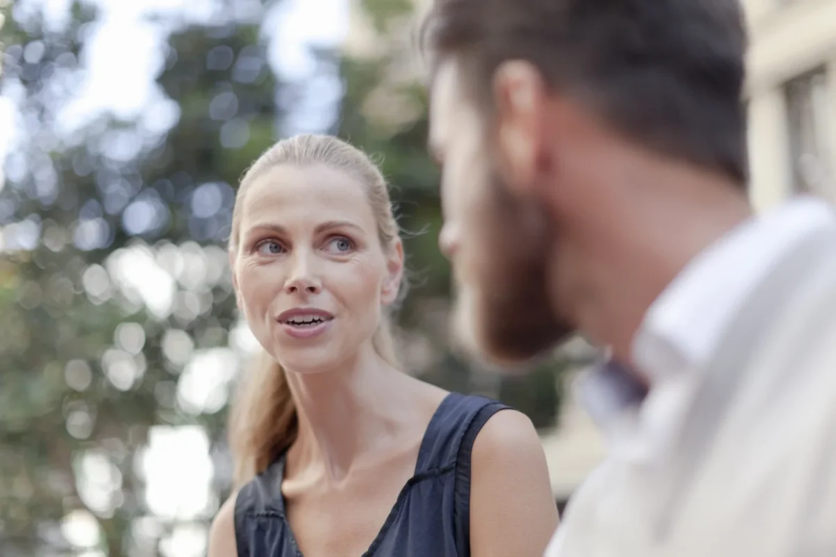 13 Crucial Ways To Show Your Husband You Appreciate Him woman talking with man