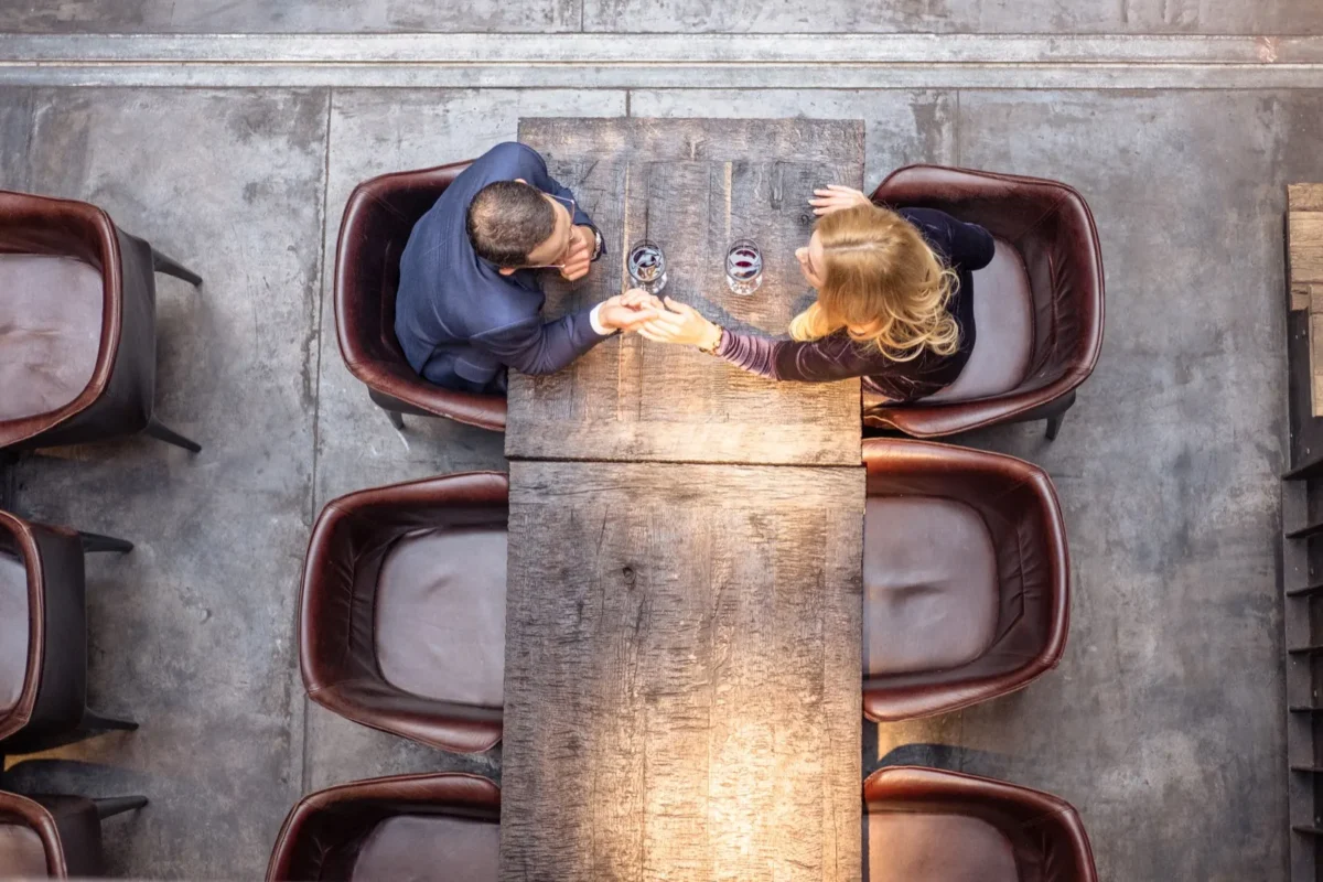 How To Get Back Together With An Introvert people holding hands over table