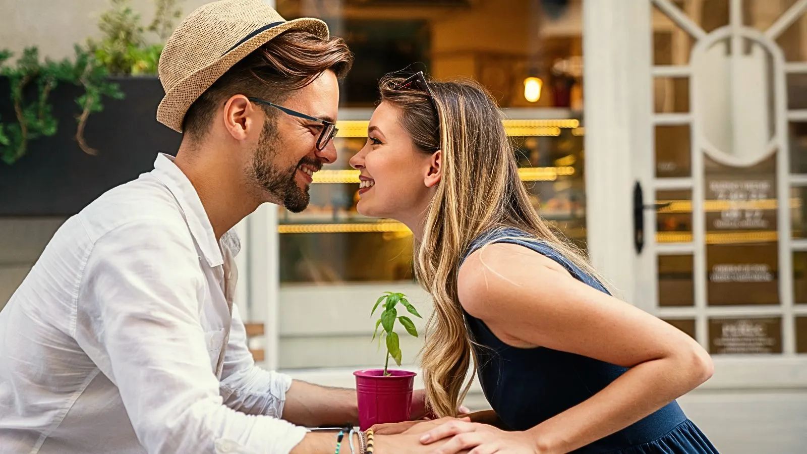 man and woman looking at each other lovingly on a date