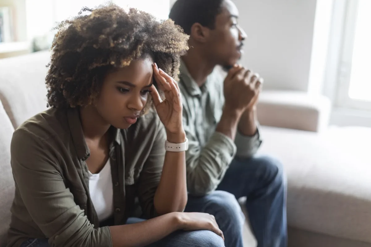woman frustrated, man looking out window