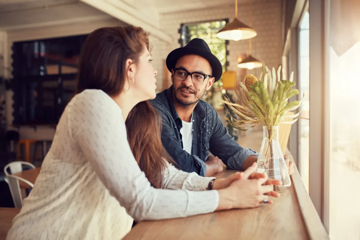 couple talking in coffee shop