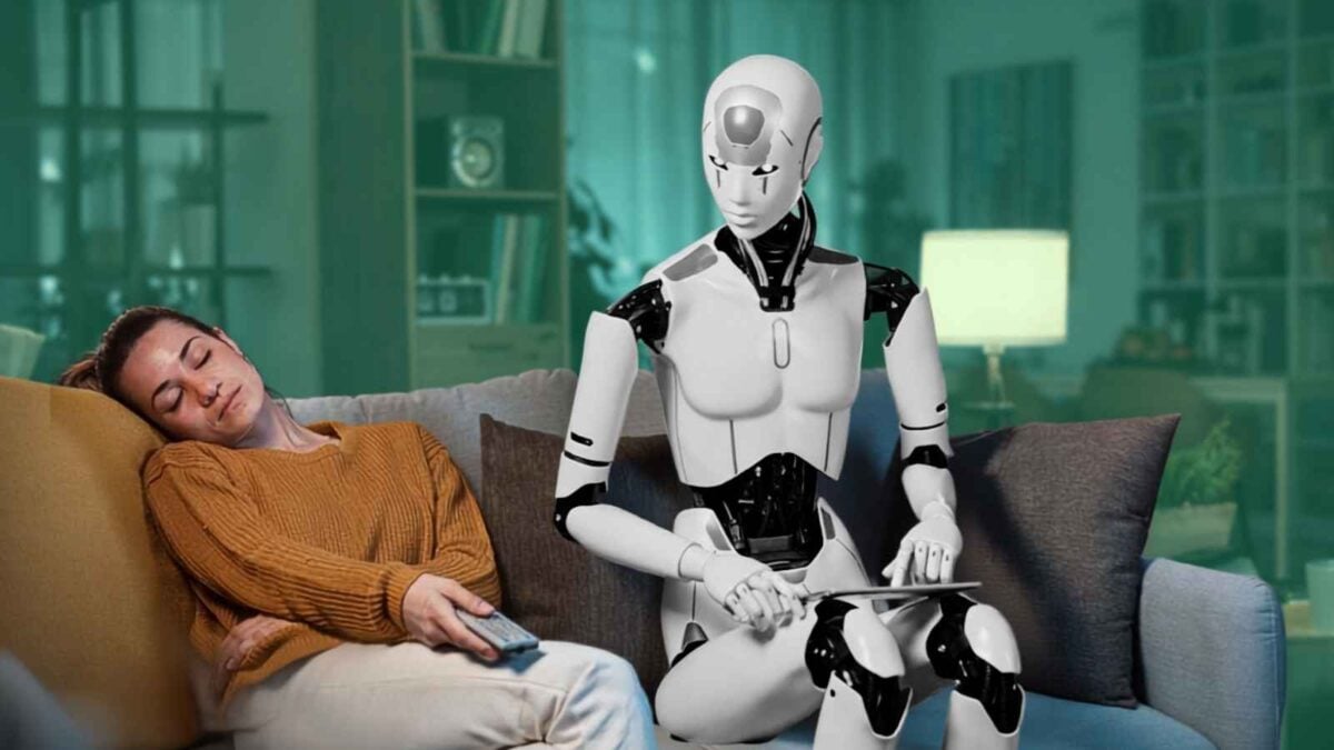 woman asleep on couch next to robot