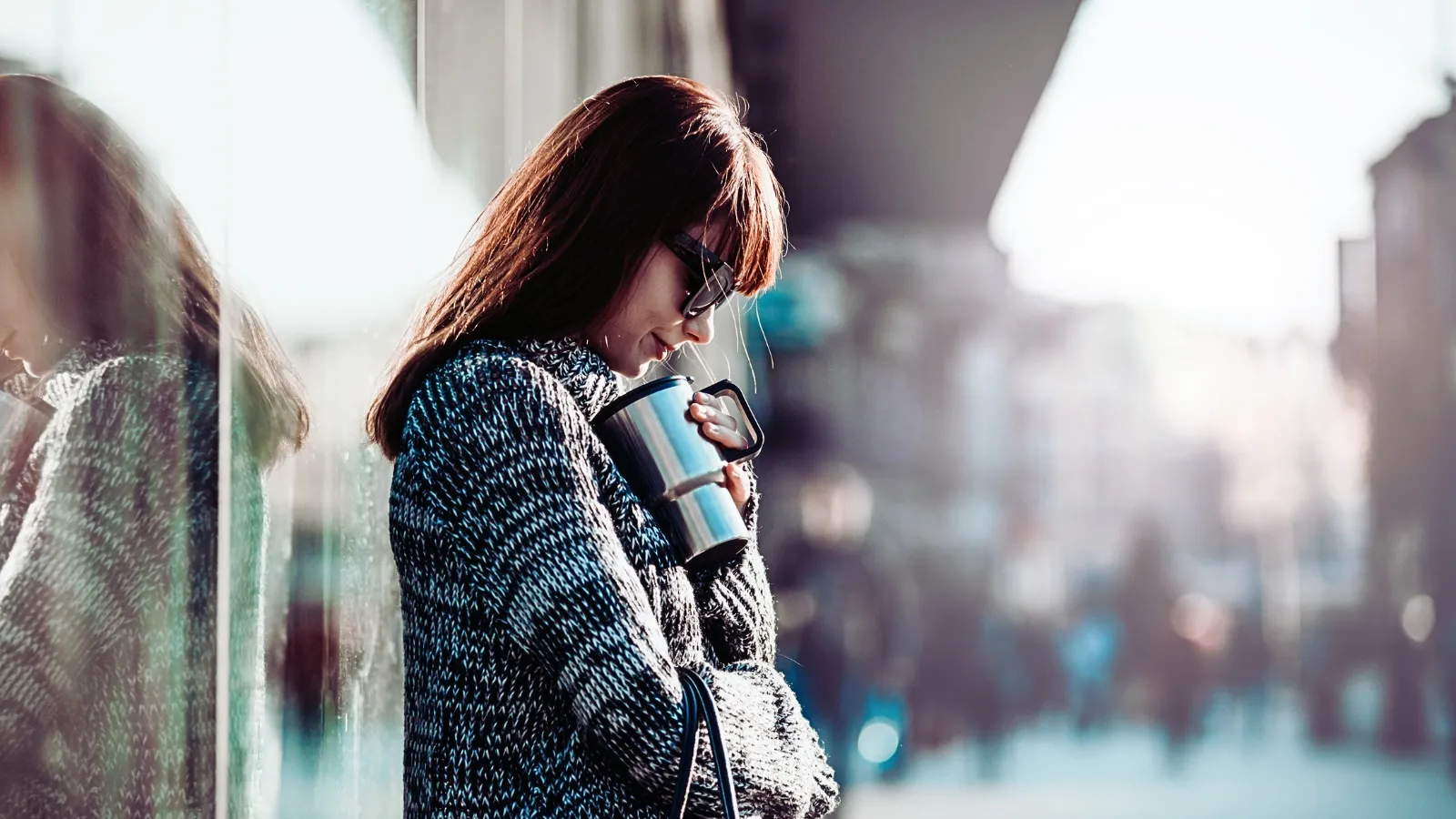 Attract The One woman with coffee