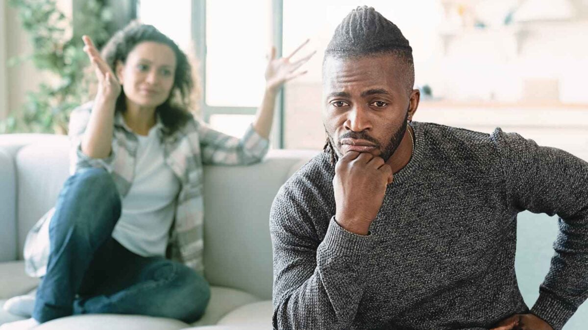 woman arguing with man who is not responding