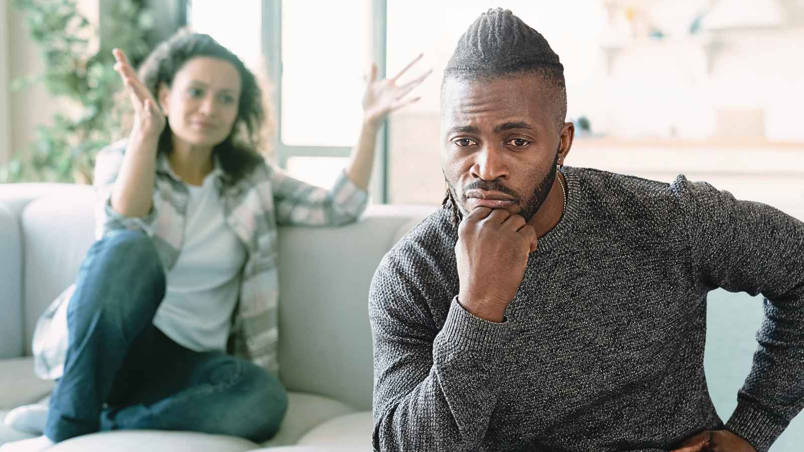 woman arguing with man who is not responding