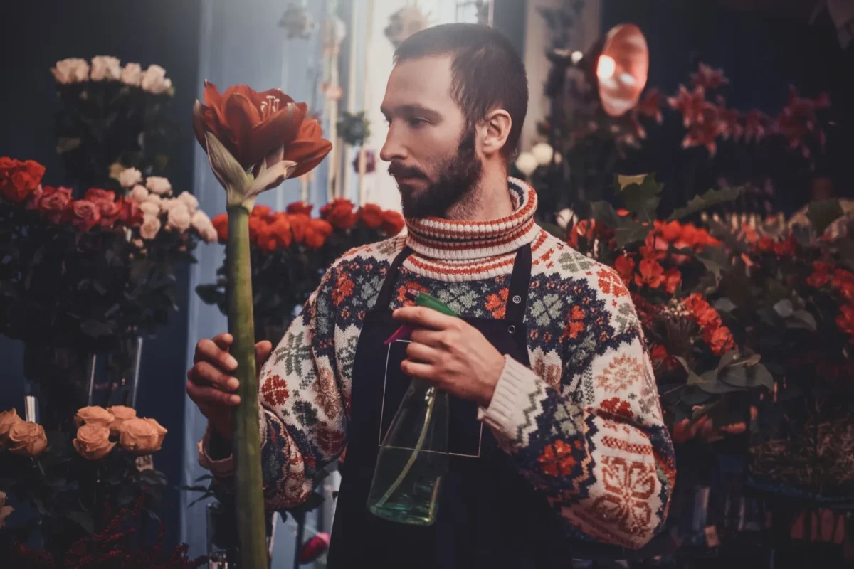 man holding flower