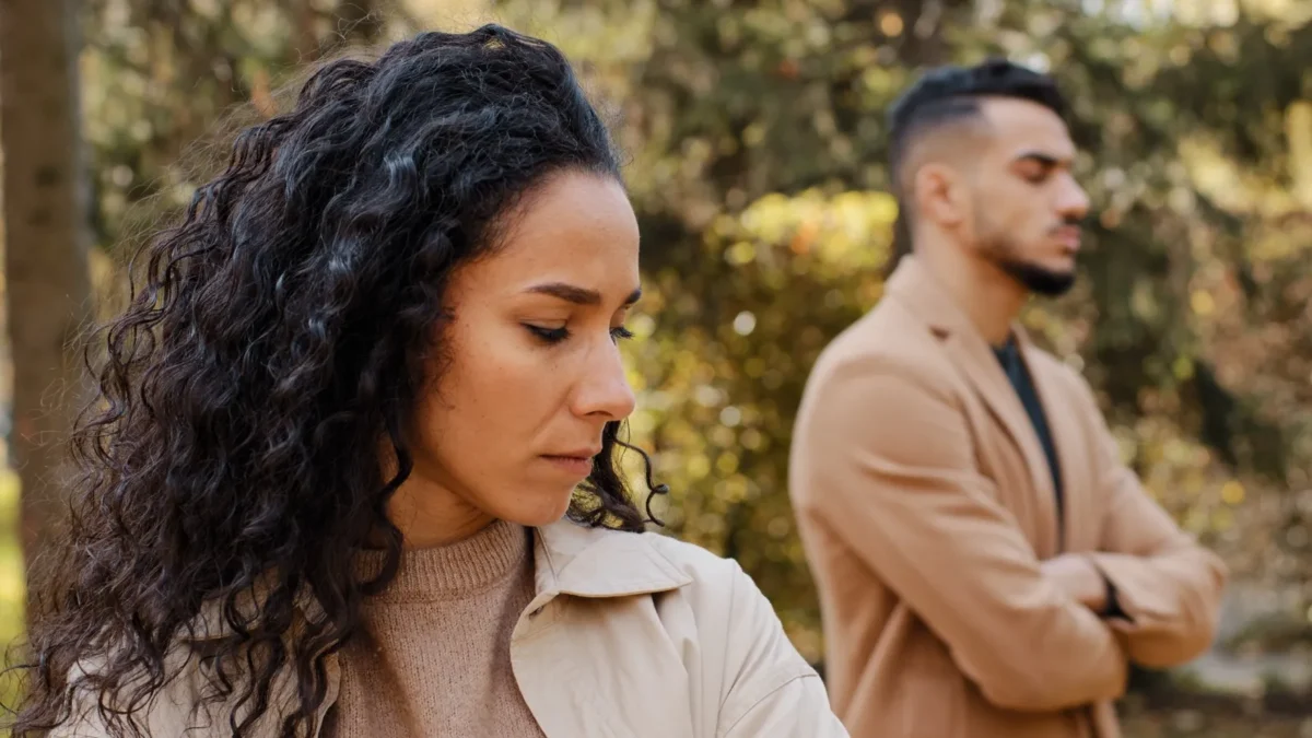 offended woman with angry man