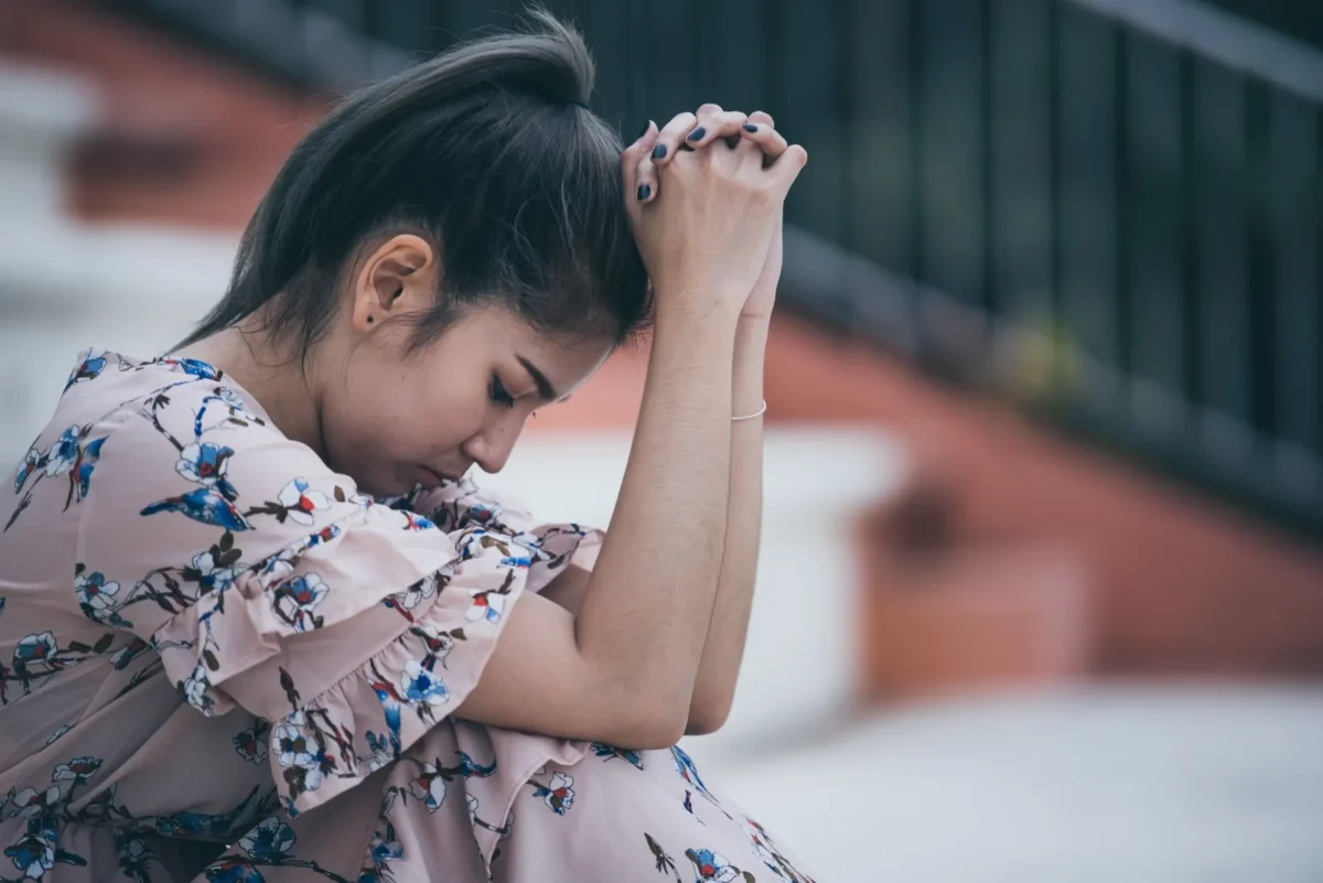 sad woman looking down