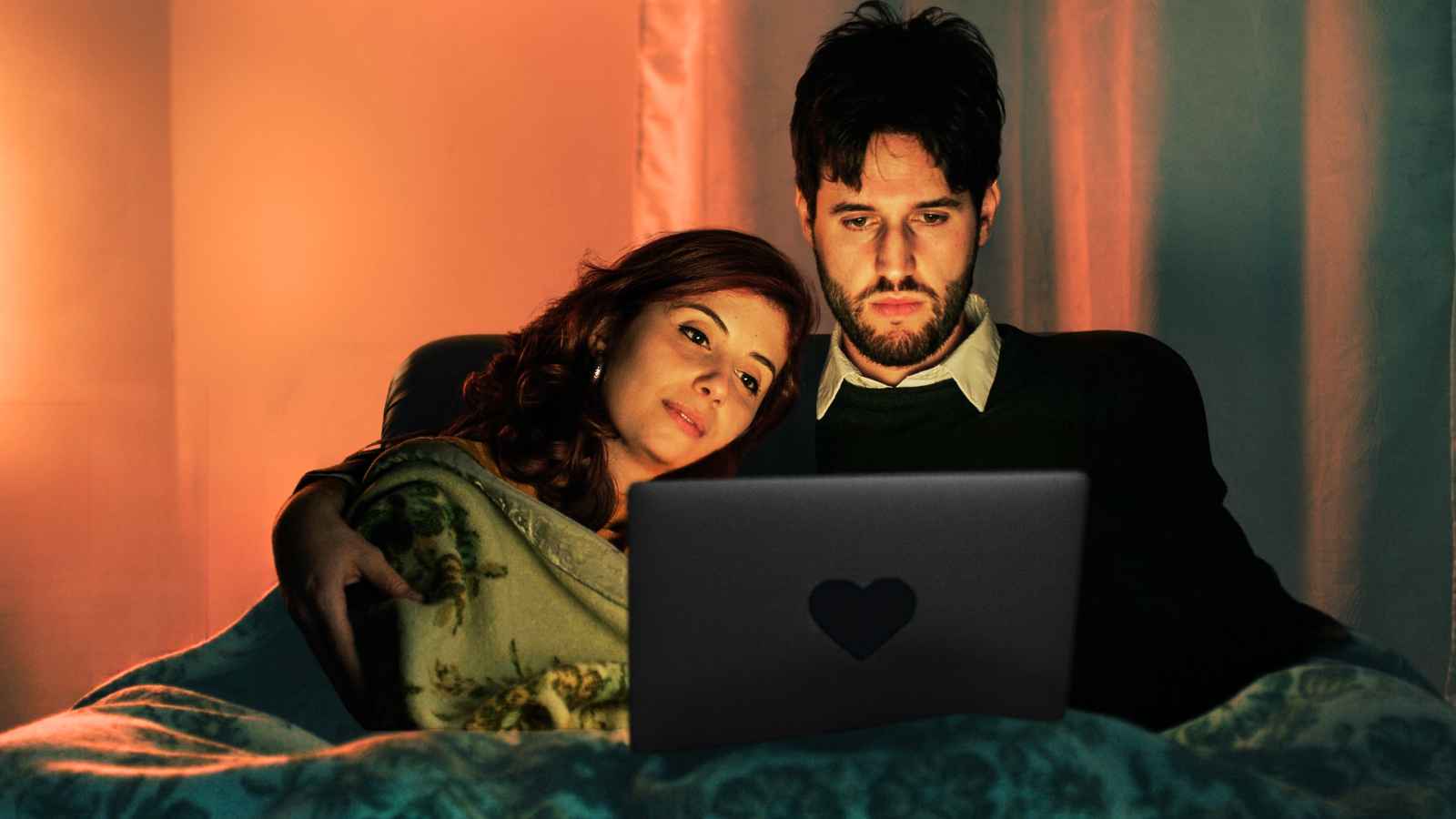 couple looking at laptop together