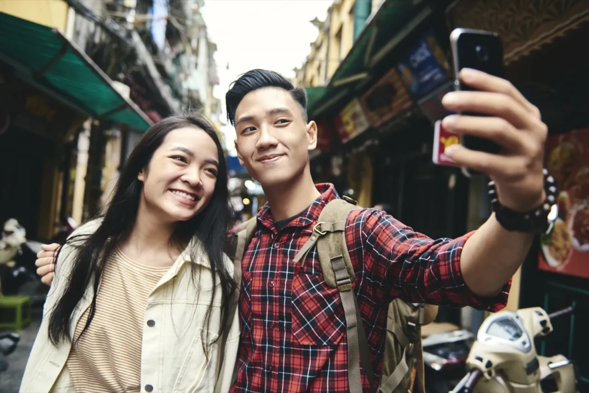 young couple taking selfie