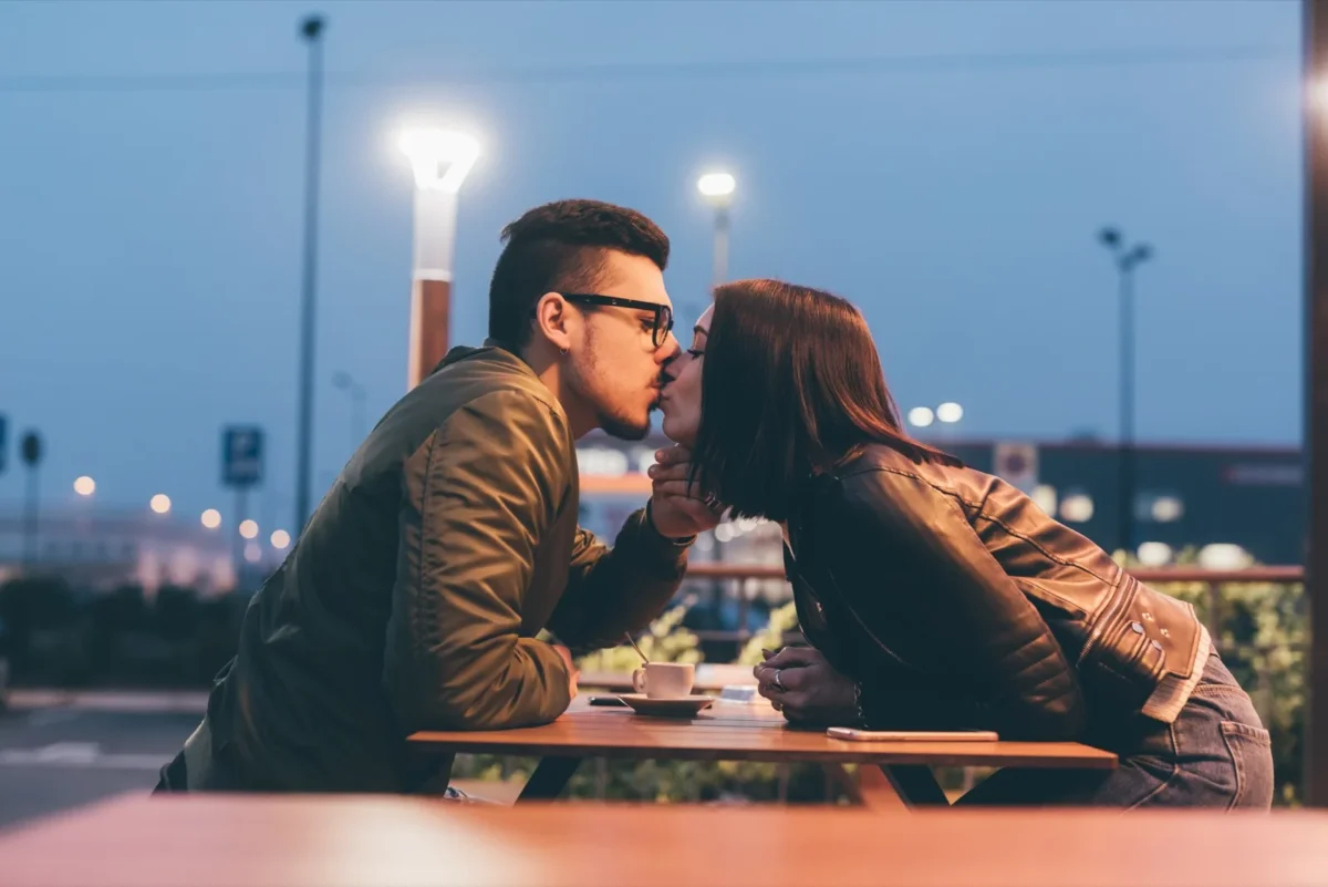 people kissing outside