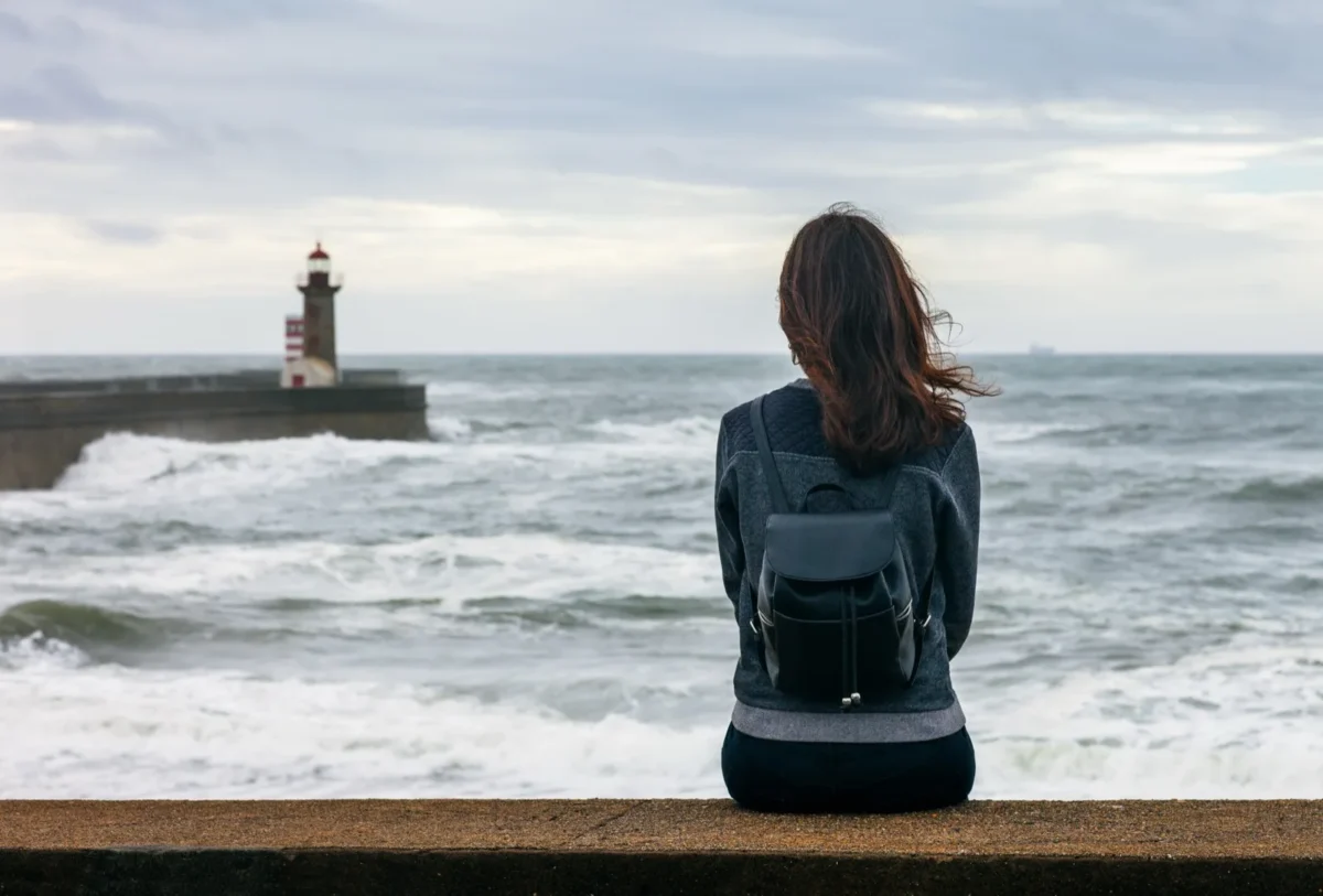 person looking at ocean