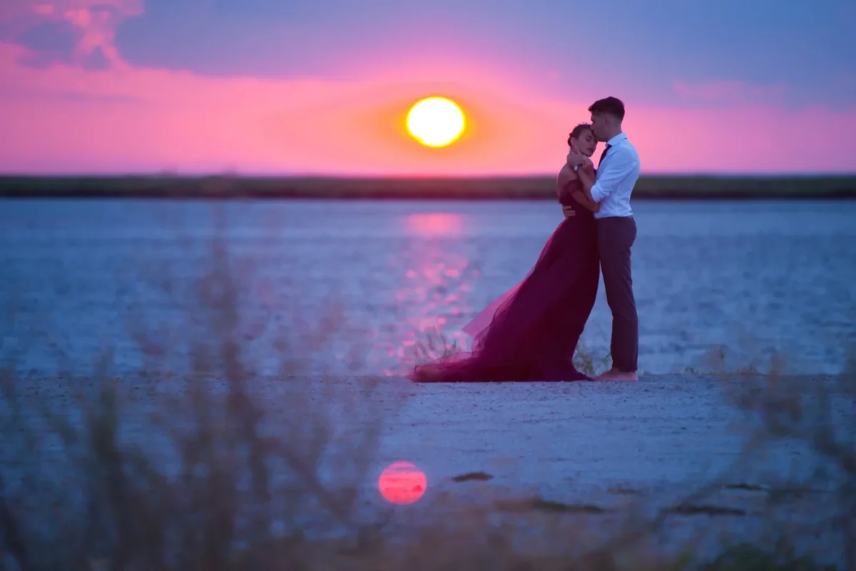 The Real Reason People Refuse to Give Up on the Soulmate Myth romantic couple at sunset