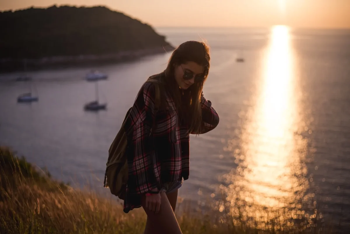 woman looking away from ocean