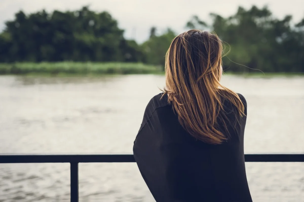 woman looking out at water